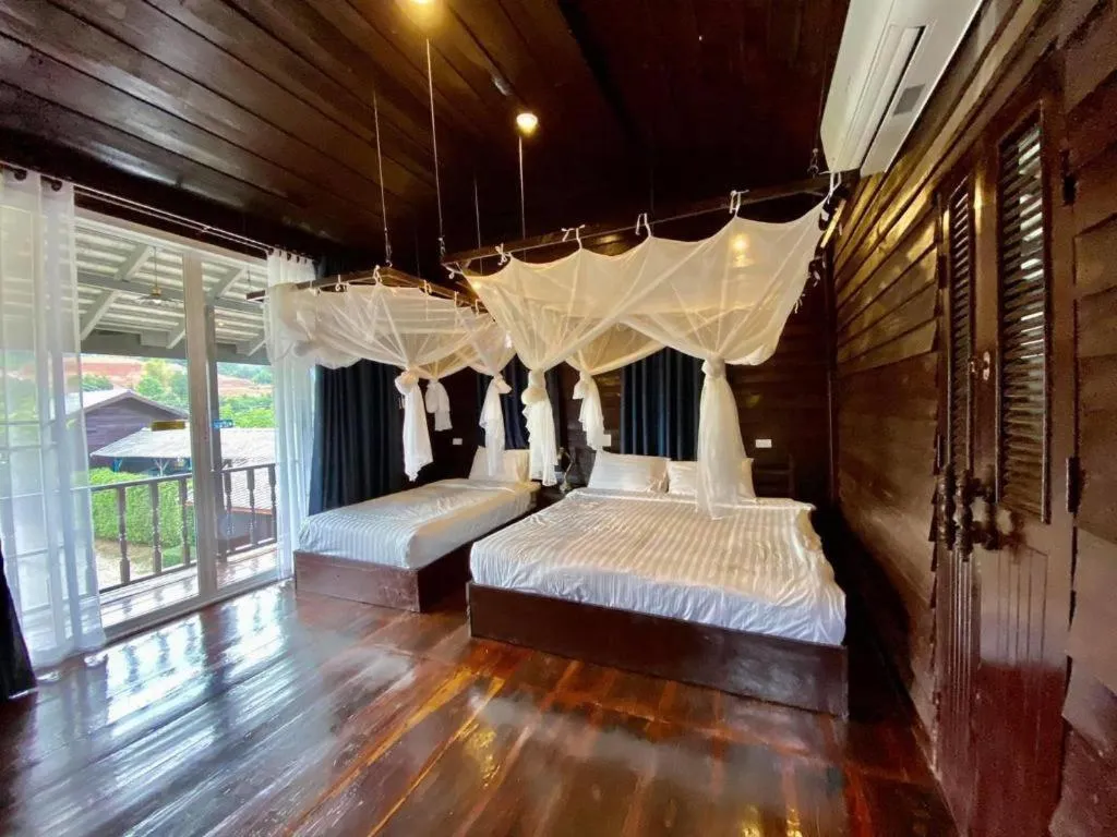 Bed in The White House Boutique Resort