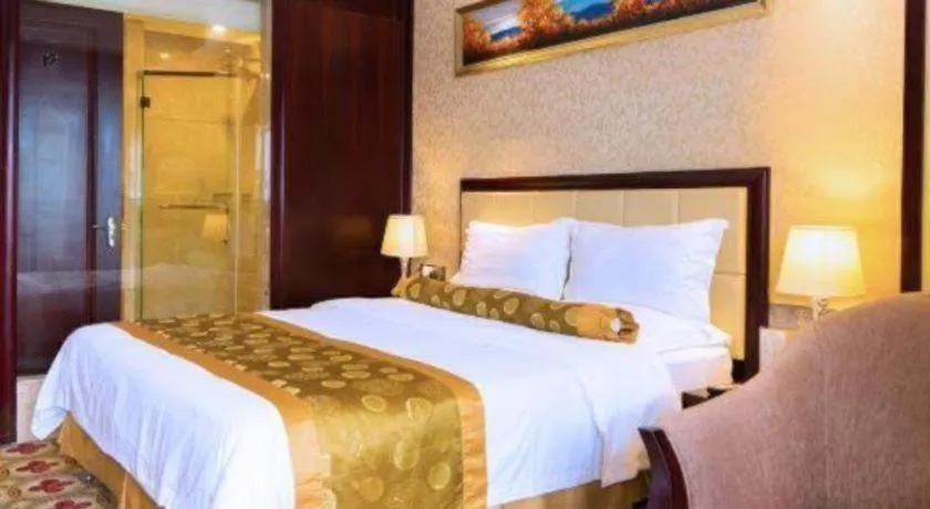 Bed in Taishan Bojue Hotel