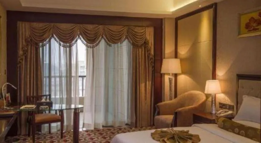 Bed in Taishan Bojue Hotel