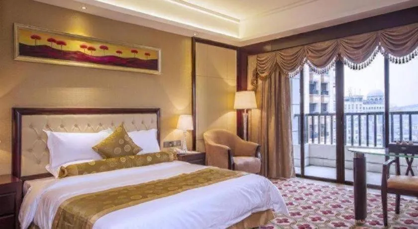 Bed in Taishan Bojue Hotel