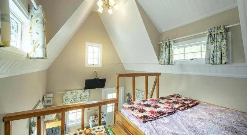 Bed in Greenview Resort