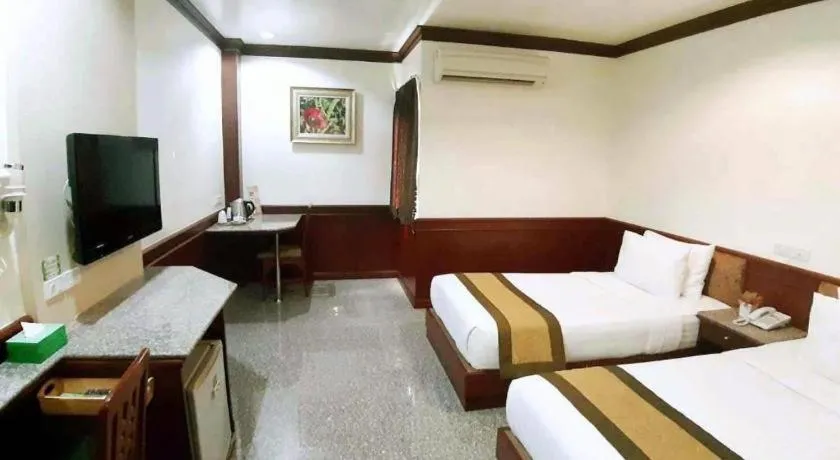 Bed in Nartsiri Hotel