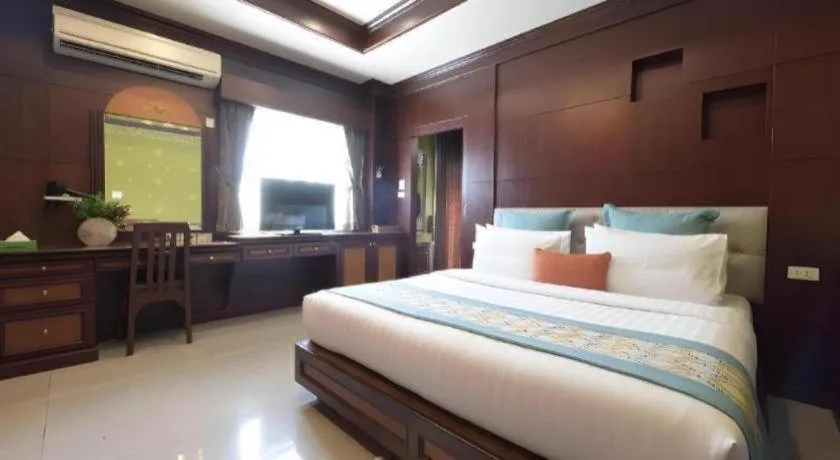 Bed in Nartsiri Hotel