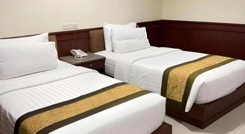 Bed in Nartsiri Hotel