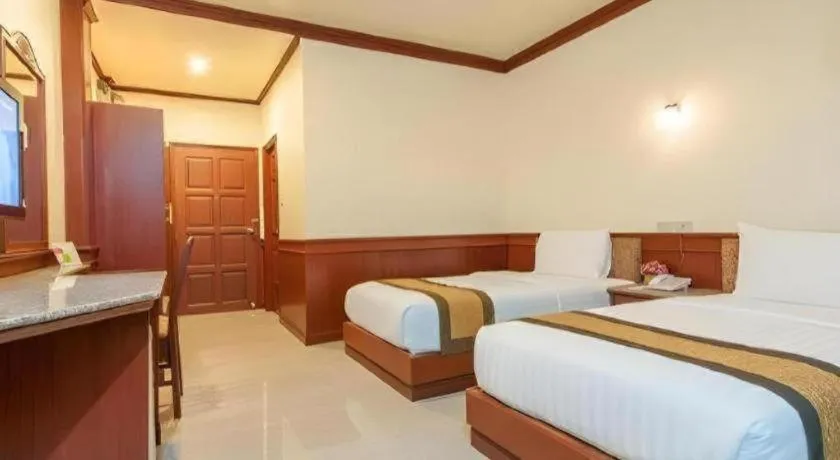 Bed in Nartsiri Hotel