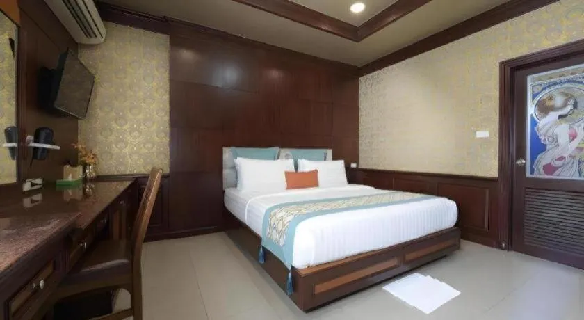 Bed in Nartsiri Hotel