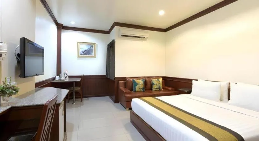 Bed in Nartsiri Hotel