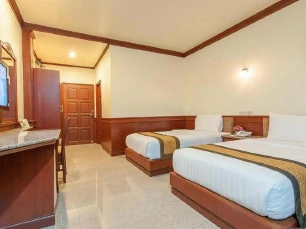 Bed in Nartsiri Hotel