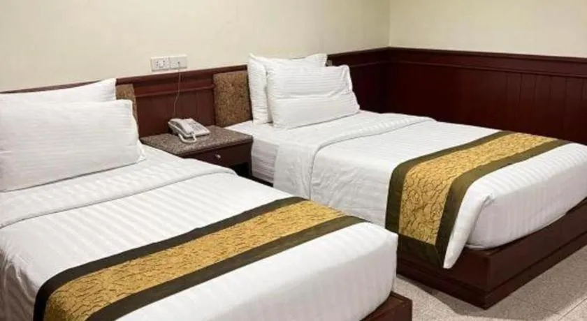 Bed in Nartsiri Hotel