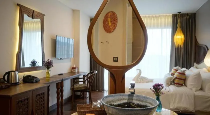 Bed in Baisirimaya Hotel