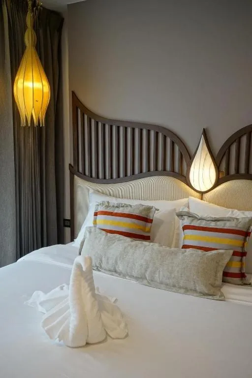 Bed in Baisirimaya Hotel