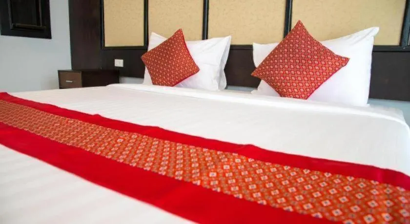 Bed in Poochommhok Resort