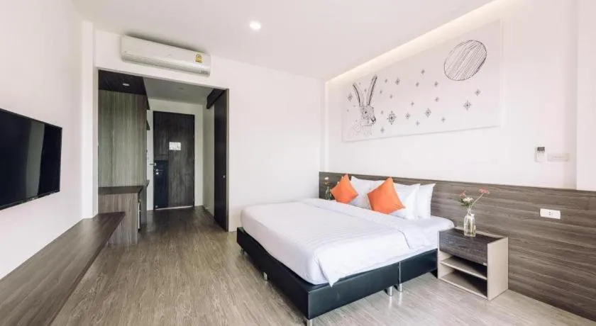 Bed in PIMDARA HOTEL