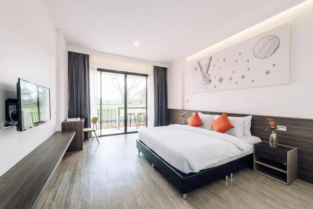 Bed in PIMDARA HOTEL