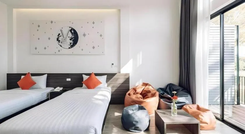 Bed in PIMDARA HOTEL