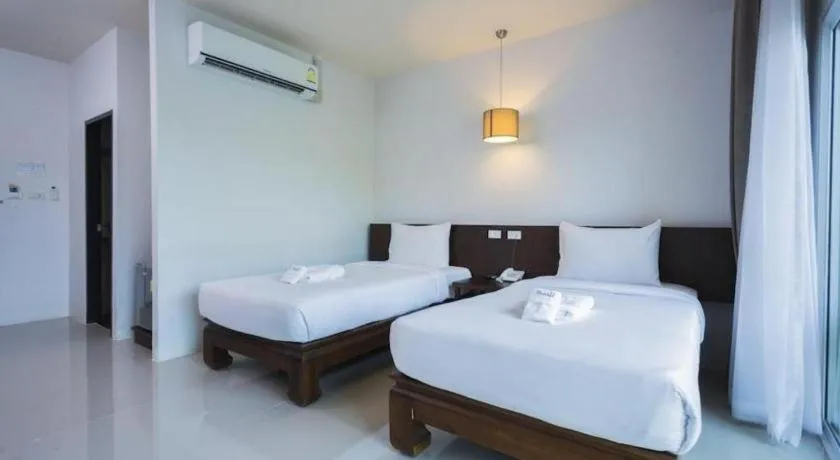 Bed in Tamali Hotel