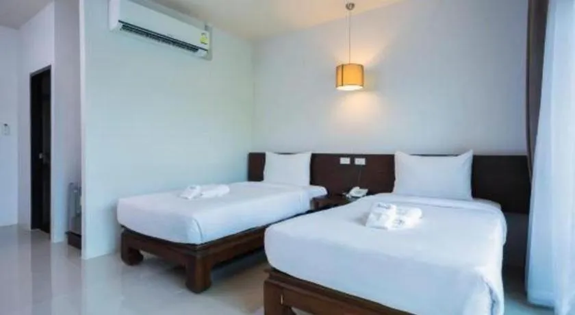 Bed in Tamali Hotel