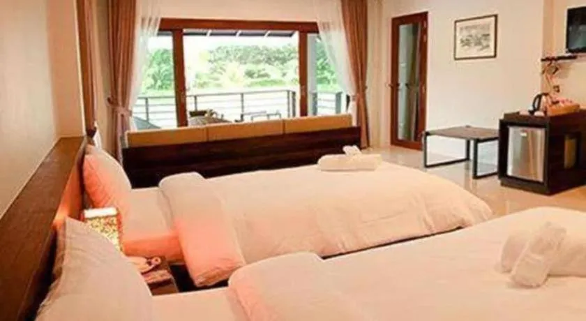 Bed in Tamali Hotel