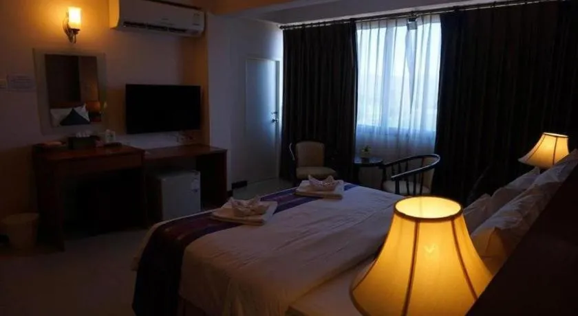 Bed in Sirimathani Hotel