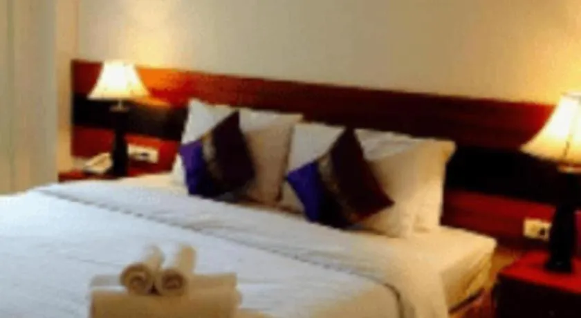 Bed in Sirimathani Hotel