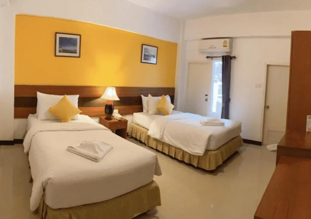 Bed in Sirimathani Hotel