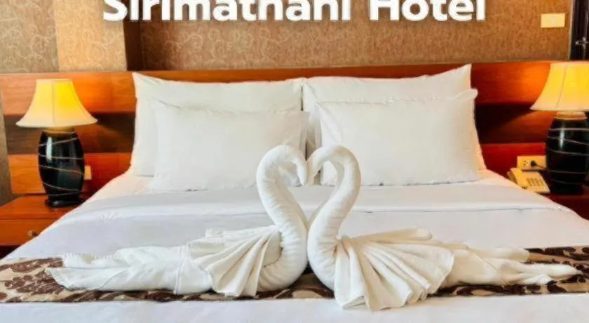Bed in Sirimathani Hotel