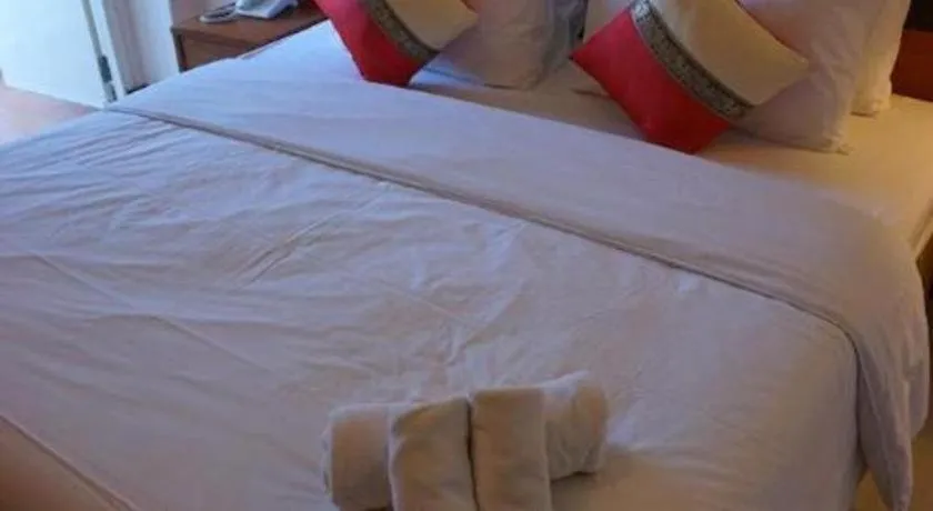 Bed in Sirimathani Hotel