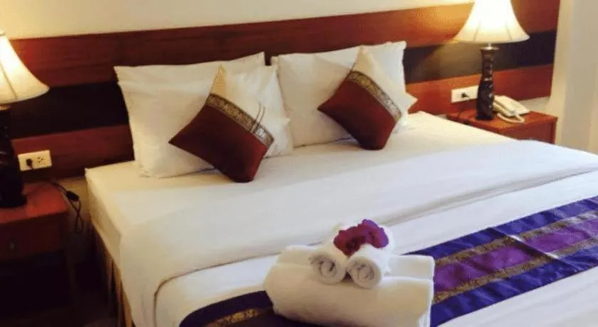 Bed in Sirimathani Hotel