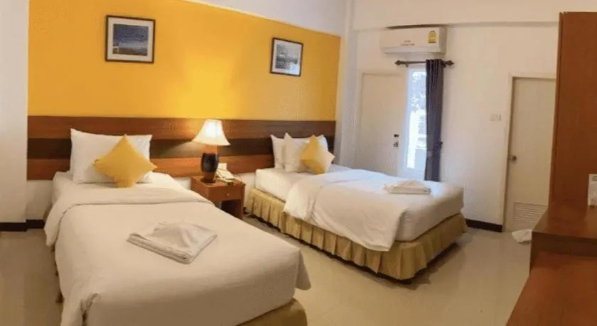 Bed in Sirimathani Hotel