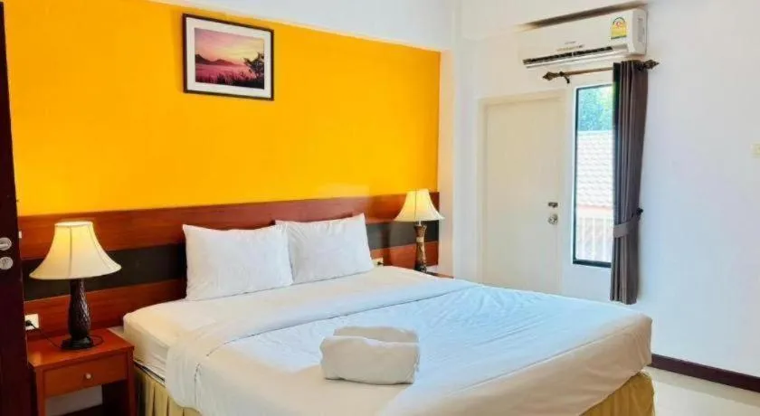 Bed in Sirimathani Hotel