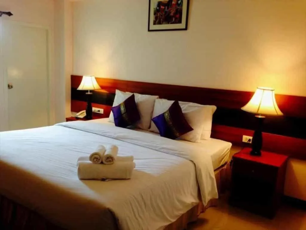 Bed in Sirimathani Hotel