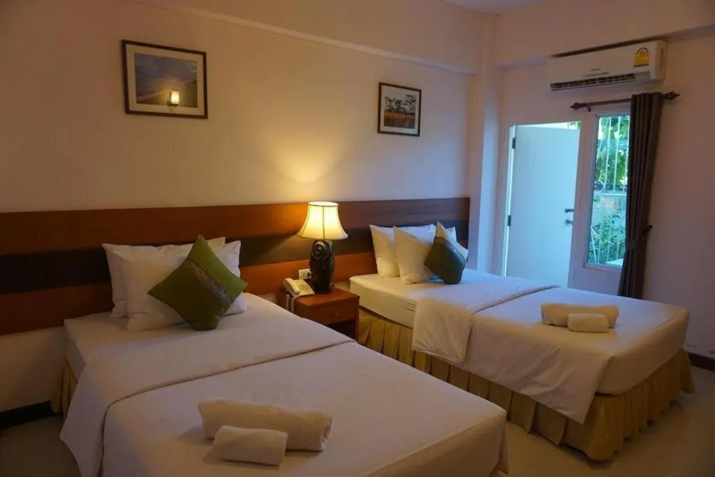 Bed in Sirimathani Hotel