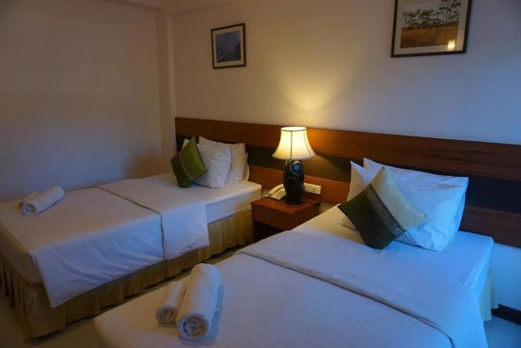 Bed in Sirimathani Hotel