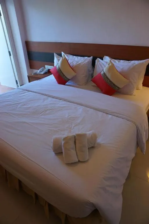 Bed in Sirimathani Hotel