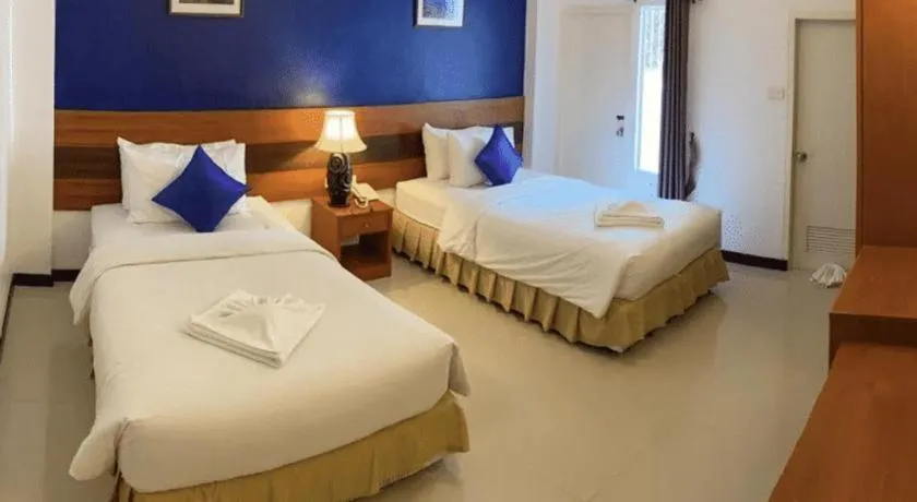 Bed in Sirimathani Hotel