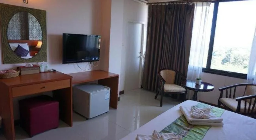 Bed in Sirimathani Hotel