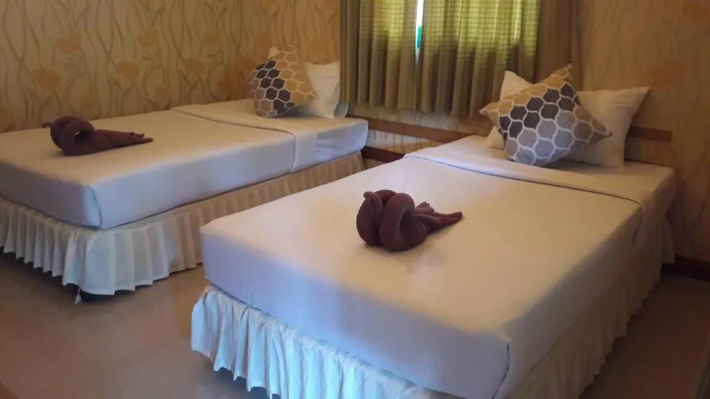 Bed in Ko Kut Ao Phrao Beach Resort