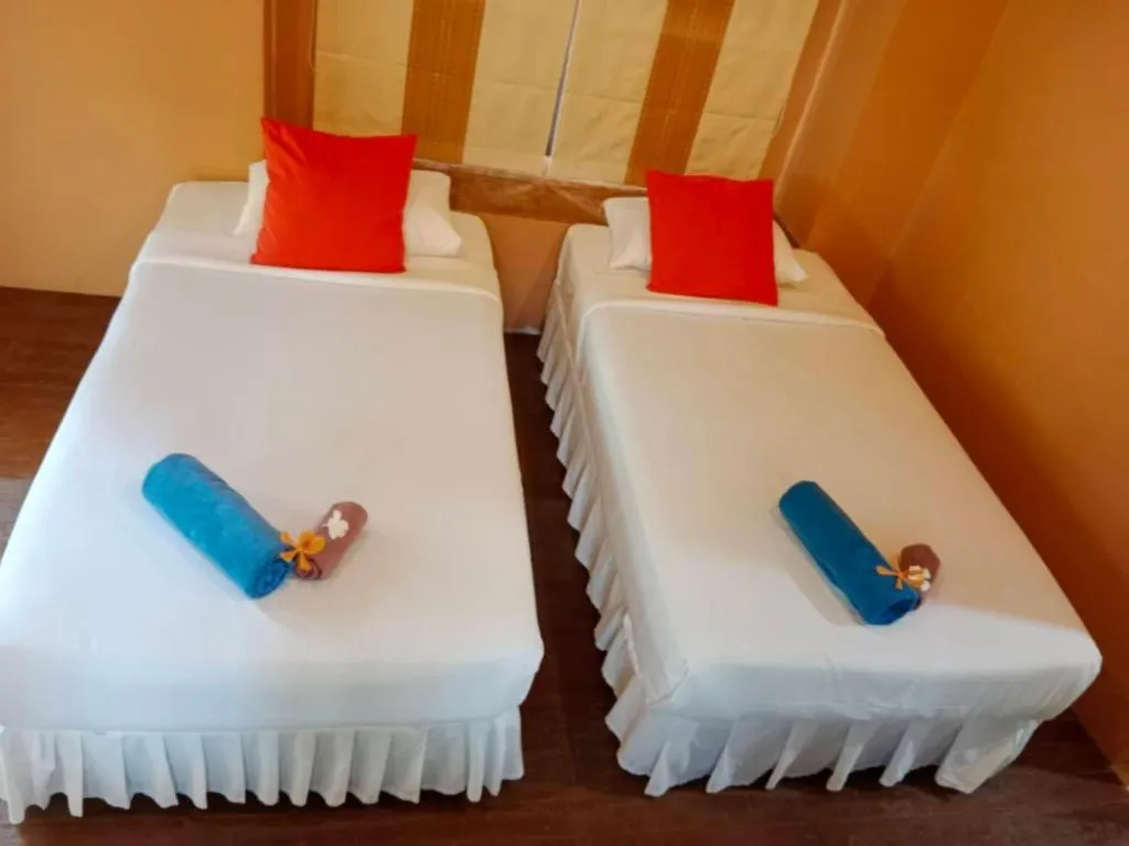 Bed in Ko Kut Ao Phrao Beach Resort