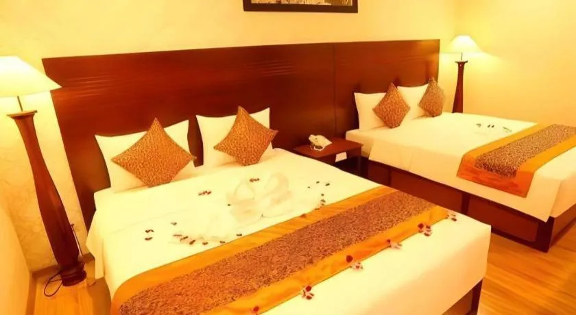 Bed in New Palace Bac Lieu Hotel