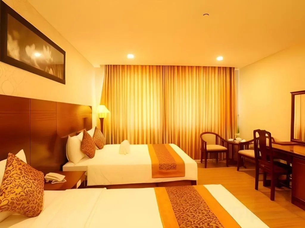 Bed in New Palace Bac Lieu Hotel