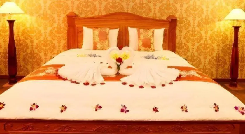 Bed in New Palace Bac Lieu Hotel