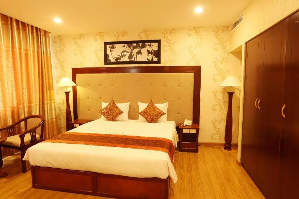 Bed in New Palace Bac Lieu Hotel