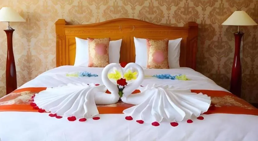 Bed in New Palace Bac Lieu Hotel