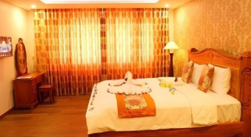 Bed in New Palace Bac Lieu Hotel