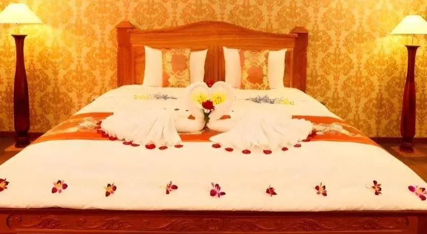 Bed in New Palace Bac Lieu Hotel