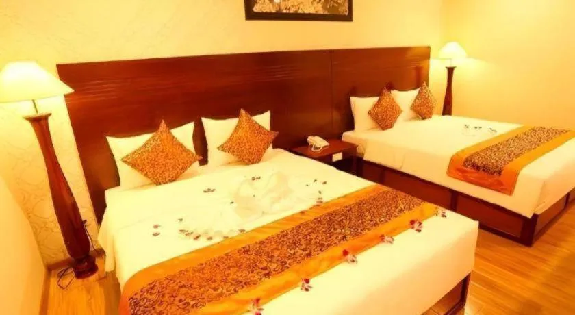 Bed in New Palace Bac Lieu Hotel