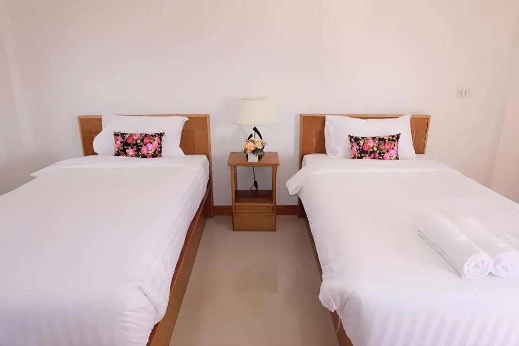 Bed in Thatphanom View Hotel Nakhon