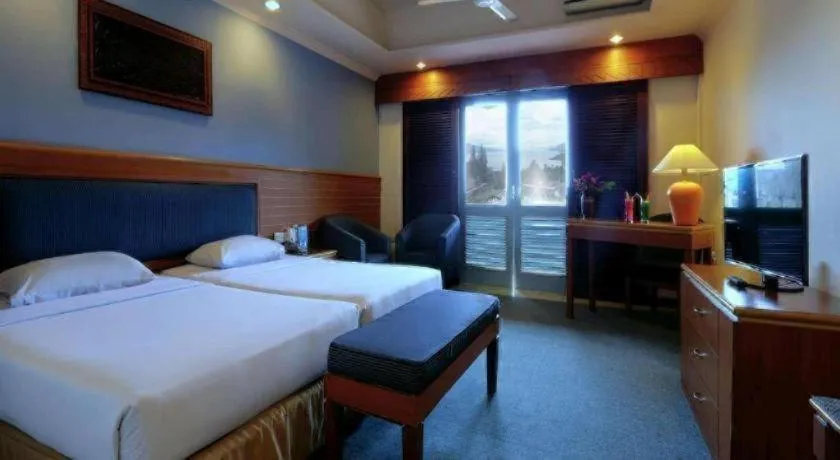 Bed in Hotel Niagara Parapat