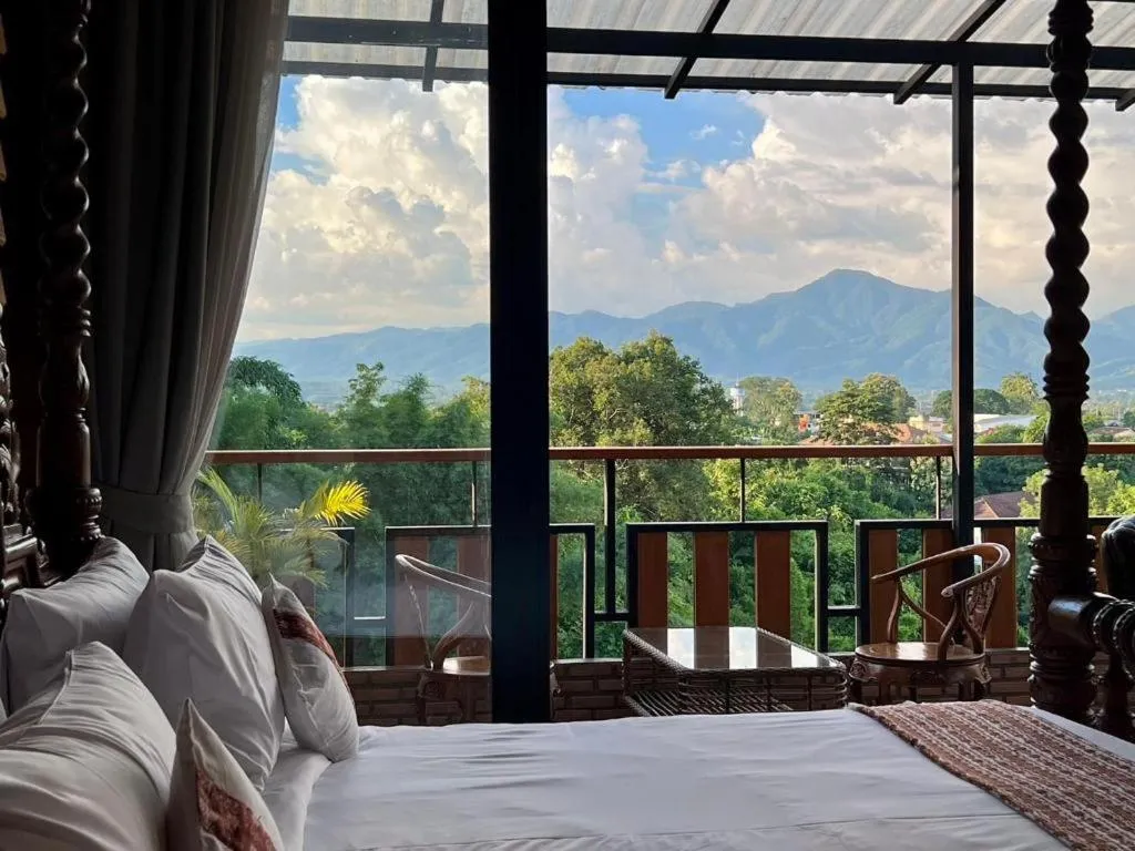 Bed in Cocoa Valley Resort