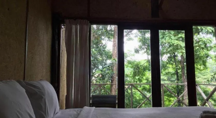 Bed in Cocoa Valley Resort